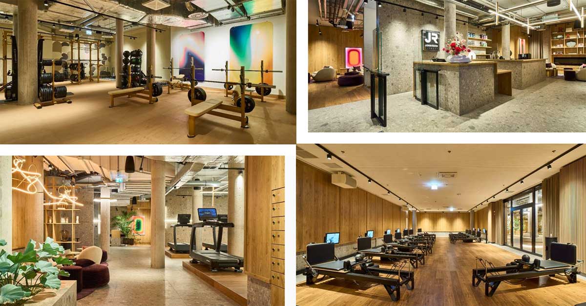 Interior of the John Reed Wien Oper fitness club with workout equipment, reception area and Reformer Pilates studio in Vienna.