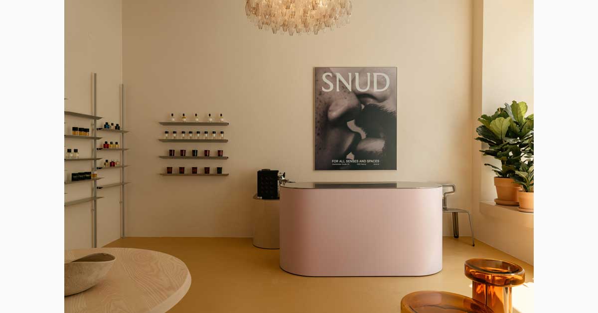 Interior of SNUD Concept Store in Vienna with fragrance displays, furniture and curated interior design.